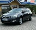 Сірий Опель Астра, об'ємом двигуна 2 л та пробігом 249 тис. км за 7299 $, фото 1 на Automoto.ua