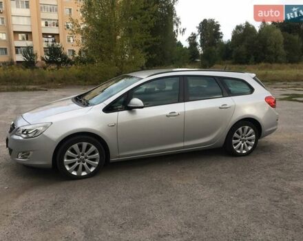 Серый Опель Астра, объемом двигателя 1.4 л и пробегом 240 тыс. км за 8300 $, фото 5 на Automoto.ua