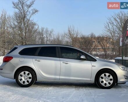 Сірий Опель Астра, об'ємом двигуна 1.3 л та пробігом 182 тис. км за 6799 $, фото 21 на Automoto.ua