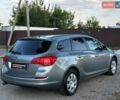 Серый Опель Астра, объемом двигателя 1.4 л и пробегом 185 тыс. км за 6300 $, фото 19 на Automoto.ua
