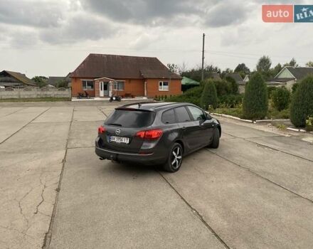 Серый Опель Астра, объемом двигателя 2 л и пробегом 320 тыс. км за 7150 $, фото 1 на Automoto.ua