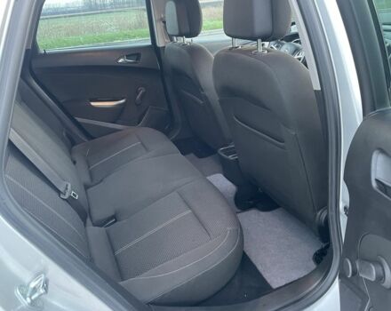 Серый Опель Астра, объемом двигателя 1.2 л и пробегом 255 тыс. км за 5700 $, фото 8 на Automoto.ua