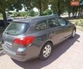 Серый Опель Астра, объемом двигателя 1.2 л и пробегом 186 тыс. км за 5900 $, фото 3 на Automoto.ua