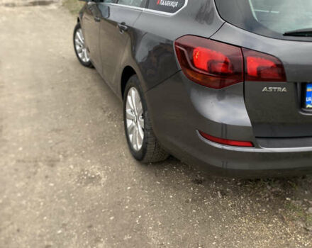 Серый Опель Астра, объемом двигателя 1.7 л и пробегом 327 тыс. км за 7800 $, фото 7 на Automoto.ua