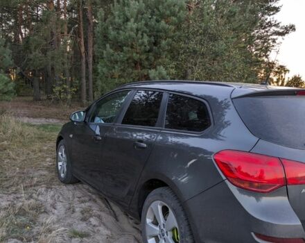 Серый Опель Астра, объемом двигателя 1.2 л и пробегом 261 тыс. км за 6500 $, фото 2 на Automoto.ua