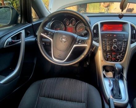 Серый Опель Астра, объемом двигателя 1.4 л и пробегом 249 тыс. км за 7300 $, фото 20 на Automoto.ua