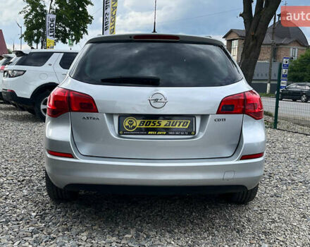 Серый Опель Астра, объемом двигателя 1.69 л и пробегом 243 тыс. км за 7500 $, фото 4 на Automoto.ua
