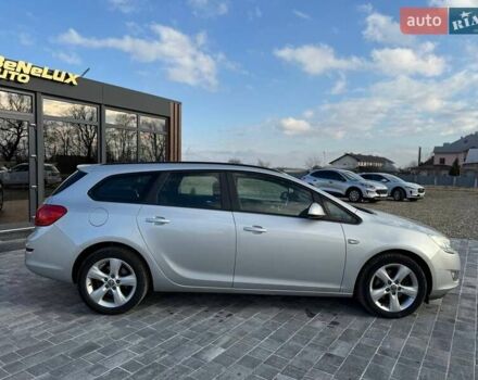 Серый Опель Астра, объемом двигателя 1.69 л и пробегом 208 тыс. км за 7699 $, фото 7 на Automoto.ua