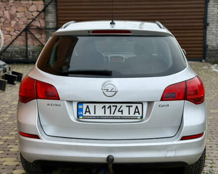 Серый Опель Астра, объемом двигателя 1.7 л и пробегом 252 тыс. км за 5900 $, фото 7 на Automoto.ua