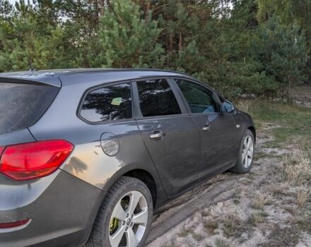 Серый Опель Астра, объемом двигателя 1.2 л и пробегом 261 тыс. км за 6500 $, фото 3 на Automoto.ua