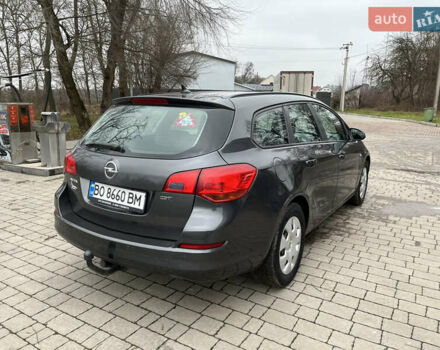 Серый Опель Астра, объемом двигателя 1.7 л и пробегом 235 тыс. км за 7500 $, фото 10 на Automoto.ua