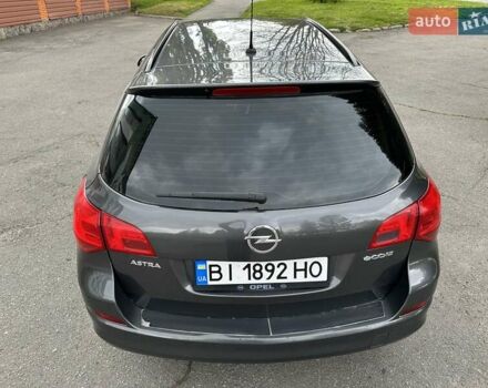 Серый Опель Астра, объемом двигателя 1.3 л и пробегом 220 тыс. км за 7100 $, фото 54 на Automoto.ua