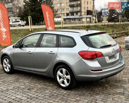 Серый Опель Астра, объемом двигателя 1.4 л и пробегом 220 тыс. км за 6300 $, фото 2 на Automoto.ua