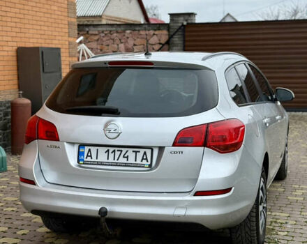 Серый Опель Астра, объемом двигателя 1.7 л и пробегом 252 тыс. км за 5900 $, фото 6 на Automoto.ua