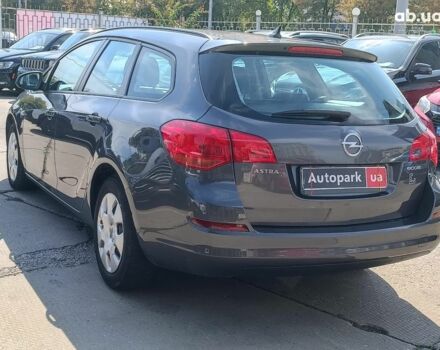 Серый Опель Астра, объемом двигателя 1.3 л и пробегом 183 тыс. км за 6690 $, фото 10 на Automoto.ua