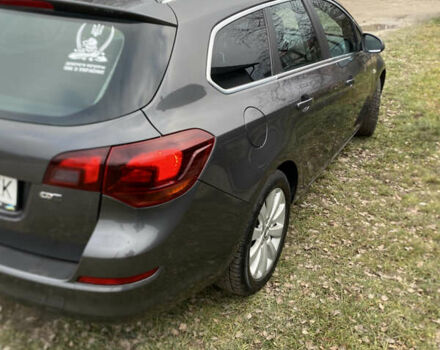 Серый Опель Астра, объемом двигателя 1.7 л и пробегом 327 тыс. км за 7800 $, фото 9 на Automoto.ua