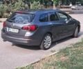 Серый Опель Астра, объемом двигателя 1.4 л и пробегом 217 тыс. км за 7300 $, фото 7 на Automoto.ua
