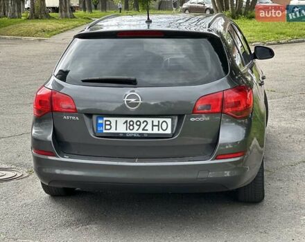 Серый Опель Астра, объемом двигателя 1.3 л и пробегом 220 тыс. км за 7100 $, фото 37 на Automoto.ua