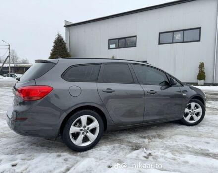 Серый Опель Астра, объемом двигателя 1.3 л и пробегом 226 тыс. км за 6300 $, фото 2 на Automoto.ua