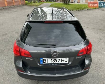 Серый Опель Астра, объемом двигателя 1.3 л и пробегом 220 тыс. км за 7100 $, фото 45 на Automoto.ua