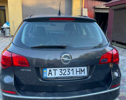 Серый Опель Астра, объемом двигателя 2 л и пробегом 300 тыс. км за 8000 $, фото 2 на Automoto.ua