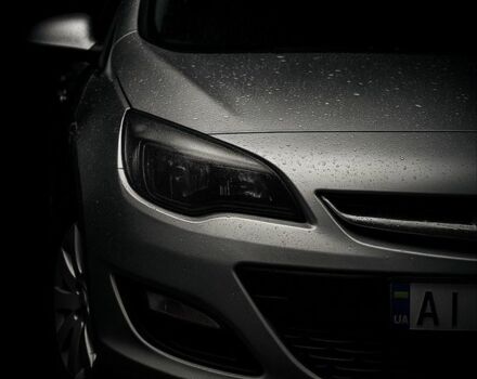 Серый Опель Астра, объемом двигателя 1.2 л и пробегом 230 тыс. км за 5600 $, фото 4 на Automoto.ua