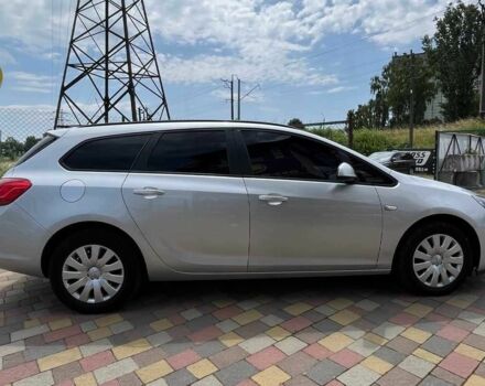 Серый Опель Астра, объемом двигателя 1.7 л и пробегом 197 тыс. км за 7400 $, фото 4 на Automoto.ua