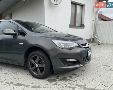 Серый Опель Астра, объемом двигателя 1.4 л и пробегом 171 тыс. км за 8600 $, фото 3 на Automoto.ua