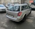 Серый Опель Астра, объемом двигателя 1.6 л и пробегом 49 тыс. км за 7500 $, фото 2 на Automoto.ua