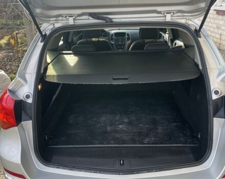 Серый Опель Астра, объемом двигателя 1.2 л и пробегом 230 тыс. км за 5600 $, фото 7 на Automoto.ua