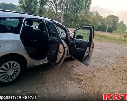 Серый Опель Астра, объемом двигателя 1.7 л и пробегом 243 тыс. км за 8600 $, фото 9 на Automoto.ua