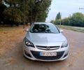 Серый Опель Астра, объемом двигателя 1.7 л и пробегом 243 тыс. км за 8600 $, фото 1 на Automoto.ua