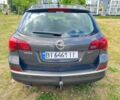 Сірий Опель Астра, об'ємом двигуна 2 л та пробігом 259 тис. км за 7539 $, фото 3 на Automoto.ua
