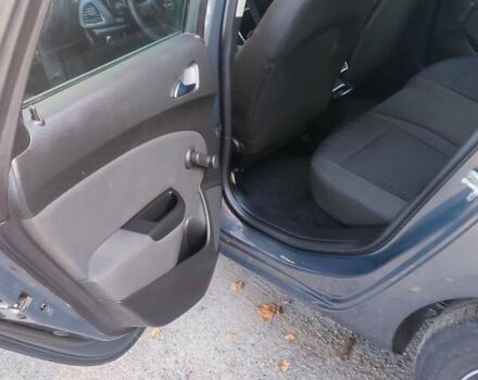 Серый Опель Астра, объемом двигателя 1.6 л и пробегом 208 тыс. км за 8000 $, фото 27 на Automoto.ua