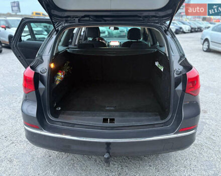 Серый Опель Астра, объемом двигателя 1.7 л и пробегом 210 тыс. км за 7990 $, фото 3 на Automoto.ua