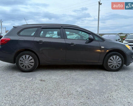 Серый Опель Астра, объемом двигателя 1.7 л и пробегом 210 тыс. км за 7990 $, фото 2 на Automoto.ua