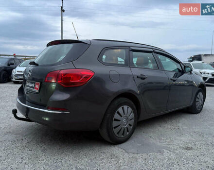 Серый Опель Астра, объемом двигателя 1.7 л и пробегом 210 тыс. км за 7990 $, фото 17 на Automoto.ua