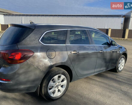 Серый Опель Астра, объемом двигателя 1.6 л и пробегом 165 тыс. км за 7700 $, фото 2 на Automoto.ua