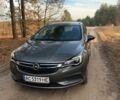 Сірий Опель Астра, об'ємом двигуна 1.6 л та пробігом 233 тис. км за 10699 $, фото 1 на Automoto.ua