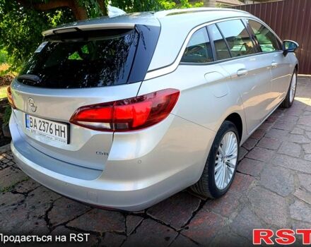 Серый Опель Астра, объемом двигателя 1.6 л и пробегом 181 тыс. км за 11000 $, фото 2 на Automoto.ua