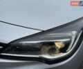 Серый Опель Астра, объемом двигателя 1.5 л и пробегом 143 тыс. км за 12500 $, фото 6 на Automoto.ua