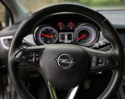 Серый Опель Астра, объемом двигателя 1.5 л и пробегом 115 тыс. км за 12599 $, фото 11 на Automoto.ua