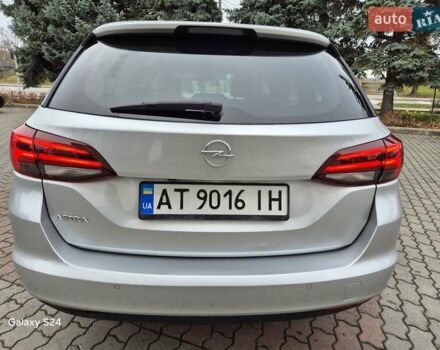 Сірий Опель Астра, об'ємом двигуна 1.5 л та пробігом 142 тис. км за 13700 $, фото 6 на Automoto.ua