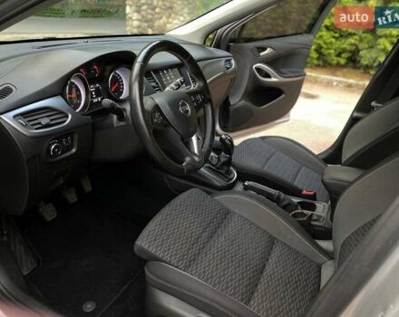 Серый Опель Астра, объемом двигателя 1.5 л и пробегом 115 тыс. км за 12599 $, фото 12 на Automoto.ua