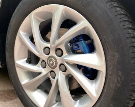 Серый Опель Астра, объемом двигателя 1.5 л и пробегом 115 тыс. км за 12599 $, фото 37 на Automoto.ua