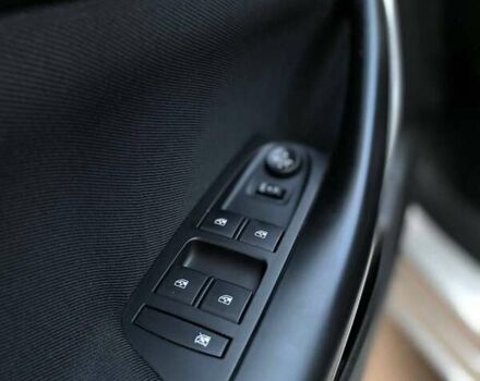 Серый Опель Астра, объемом двигателя 1.5 л и пробегом 115 тыс. км за 12599 $, фото 25 на Automoto.ua