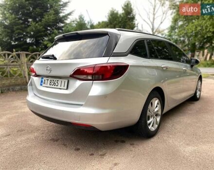 Серый Опель Астра, объемом двигателя 1.5 л и пробегом 115 тыс. км за 12599 $, фото 7 на Automoto.ua