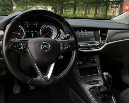 Серый Опель Астра, объемом двигателя 1.5 л и пробегом 115 тыс. км за 12599 $, фото 10 на Automoto.ua