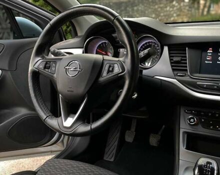 Серый Опель Астра, объемом двигателя 1.5 л и пробегом 115 тыс. км за 12599 $, фото 13 на Automoto.ua