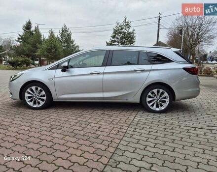 Сірий Опель Астра, об'ємом двигуна 1.5 л та пробігом 142 тис. км за 13700 $, фото 1 на Automoto.ua